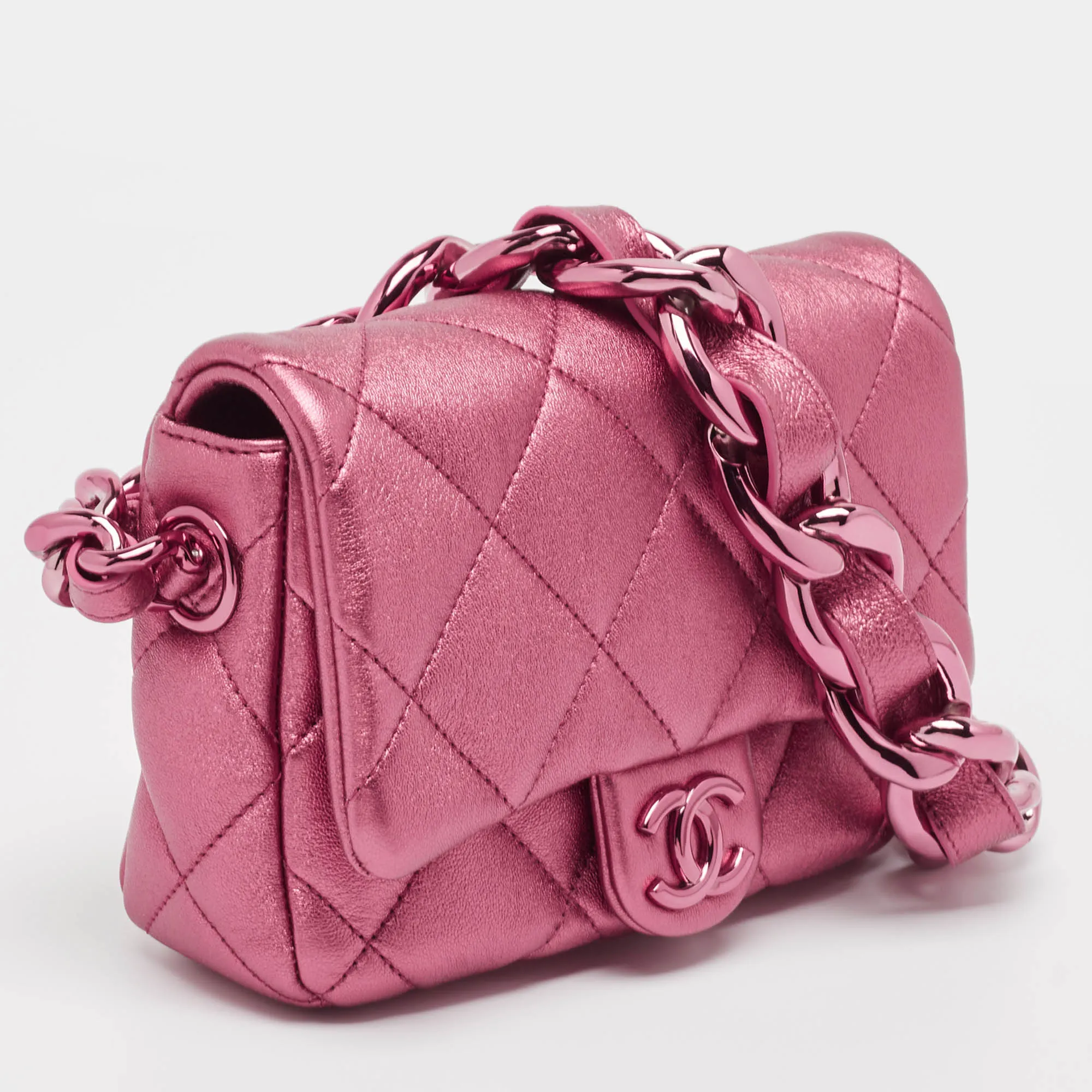 CHANEL Metallic Pink Quilted Leather Mini Flap Bag